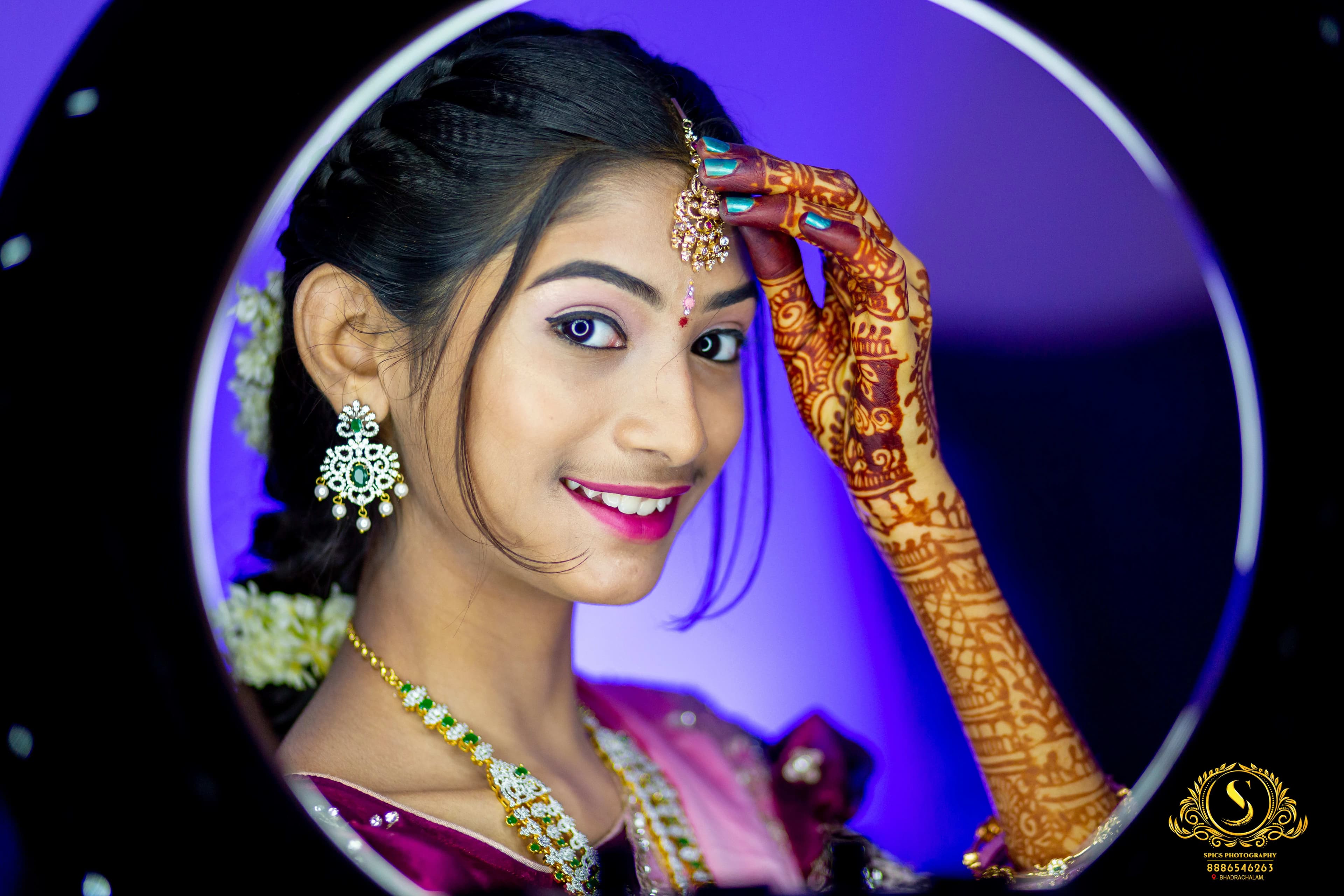 Young woman in traditional half saree with gold jewellery