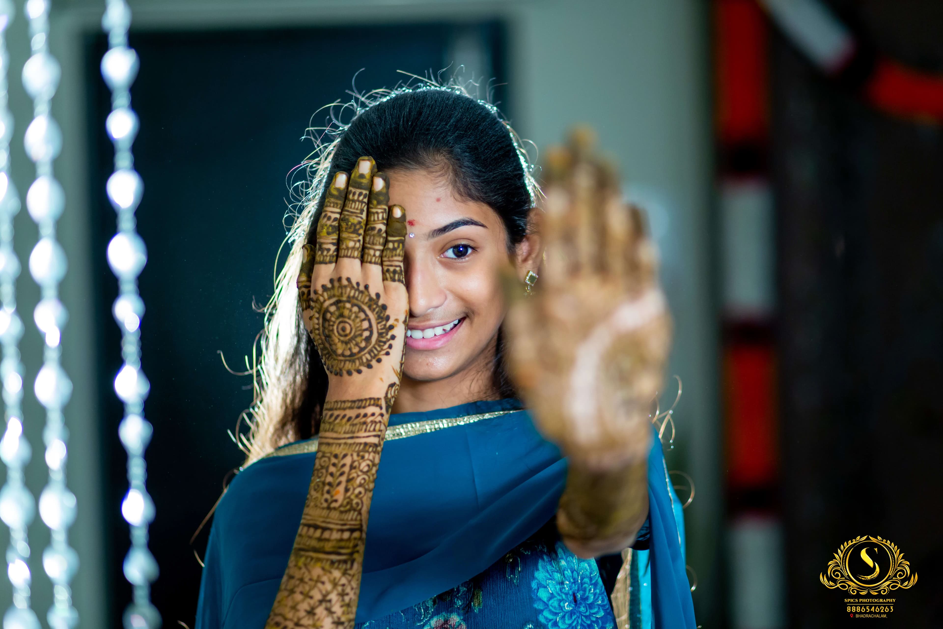 Bridal mehandi details with jewellery