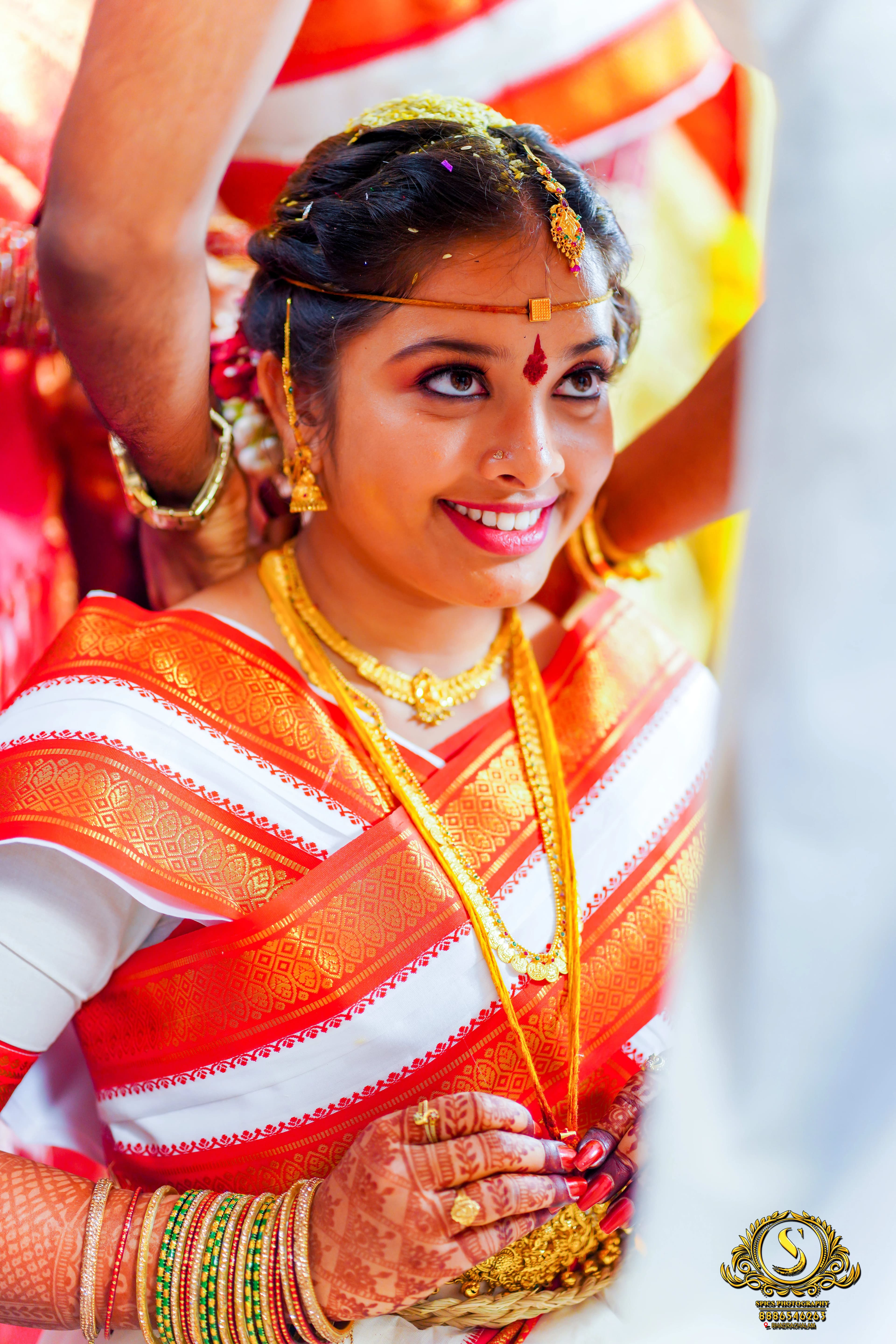 Bridal portrait with golden bokeh background